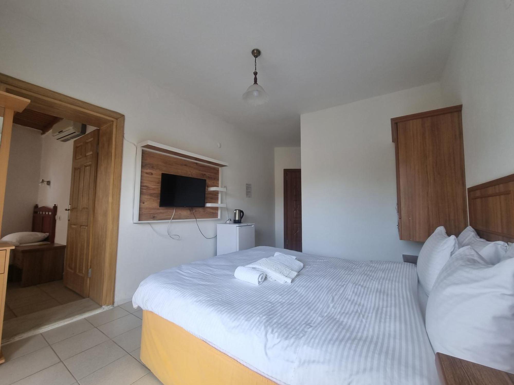 Sunset Boutique Hotel & Apartments Чирали Номер фото