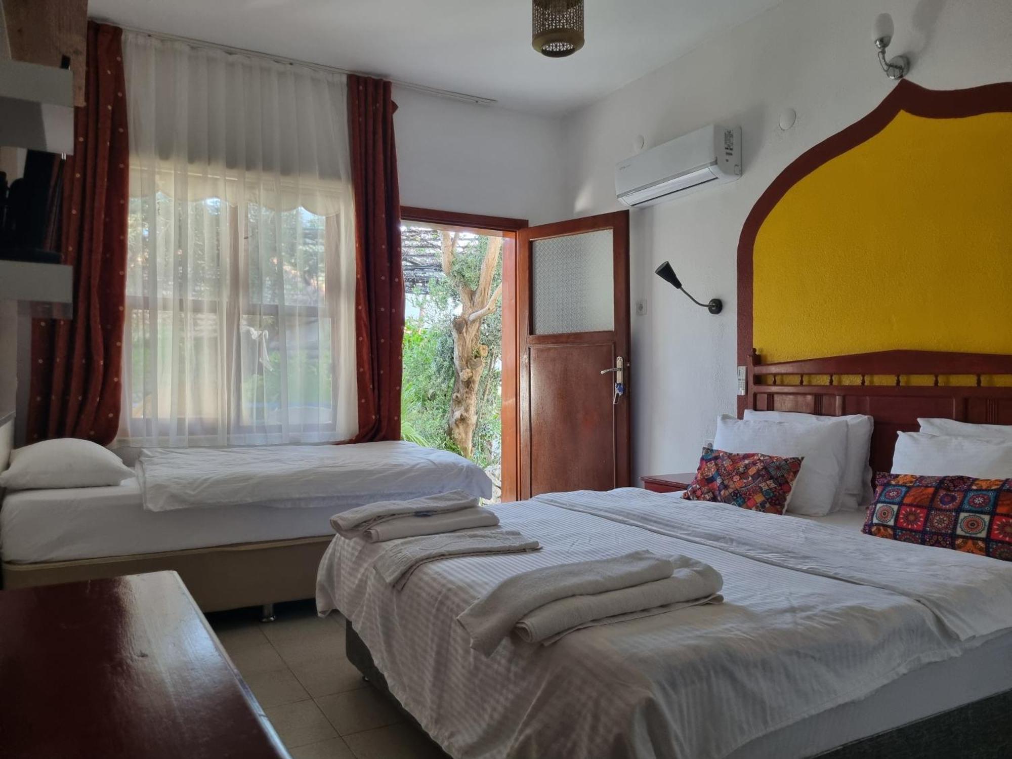Sunset Boutique Hotel & Apartments Чирали Номер фото